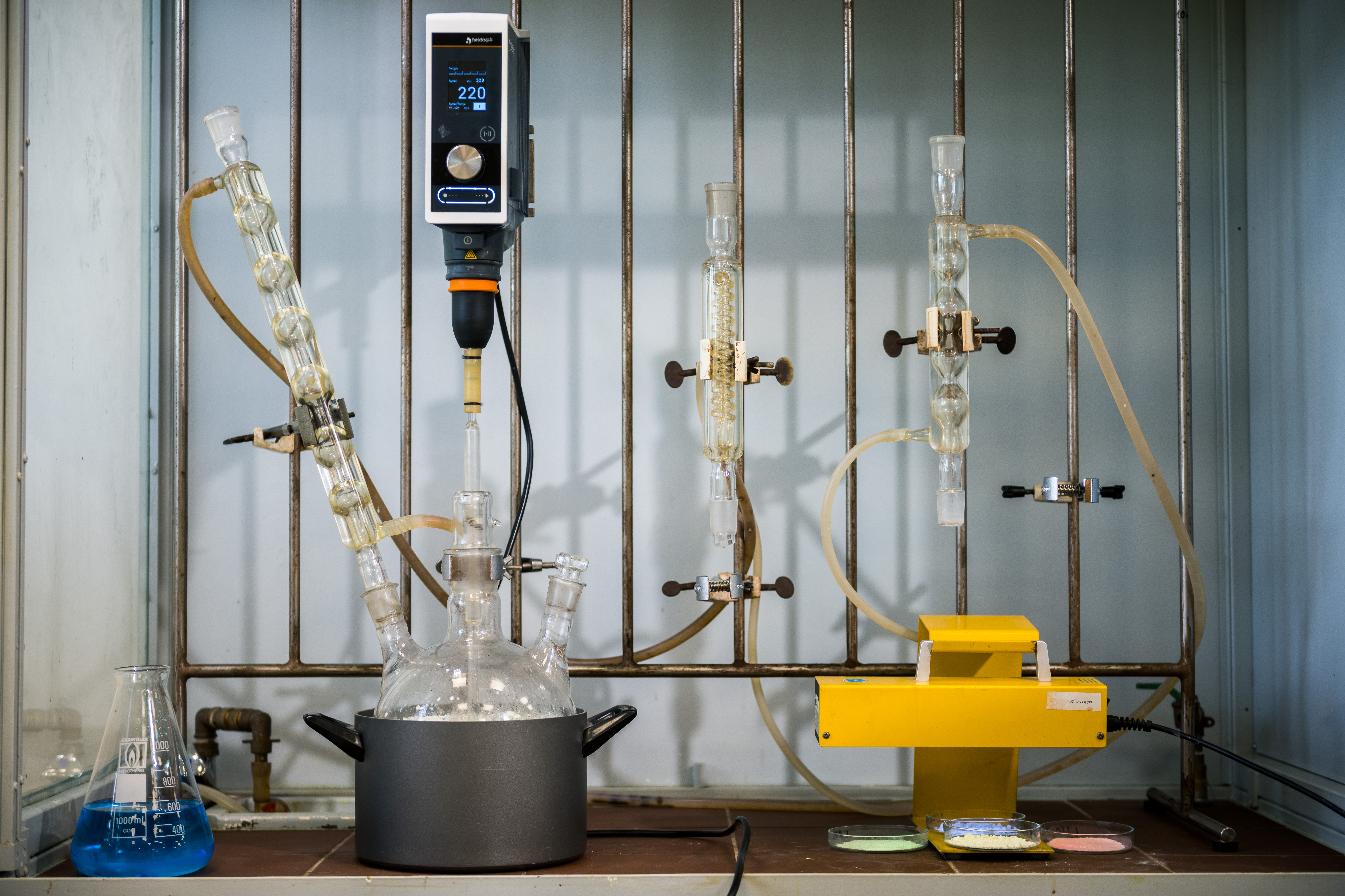 Chemical synthesis lab setup with distillation glassware